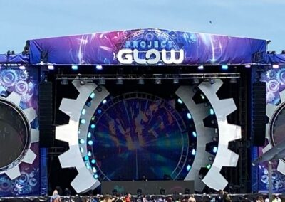 Glow Festival Stage with lights and people in the background
